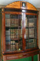 Books of Monroe's collection in mourning cabinet in study at Ash Lawn-Highland. Charlotttesville, VA.