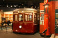 Display of early 20th C objects and streetcar at Museum of Virginia History. Richmond, VA.