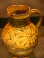 Earthenware sgraffito slipware jug from North Devon, England in Jamestown National Park Museum. Jamestown, VA.