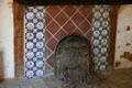 Fireplace with Delft tiles inside governor's house in Fort James at Jamestown Settlement. Jamestown, VA.