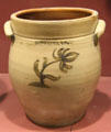 Stoneware jar painted with flower by L. Norton & Co. at Bennington Museum. Bennington, VT.