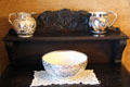 Silver-colored lusterware pitchers & bowl at Park-McCullough Historic Estate. North Bennington, VT.