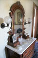 Renaissance-style bureau with mirror at Park-McCullough Historic Estate. North Bennington, VT.