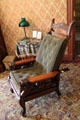 Reclining Morris chair with lion handles in sitting room of farm house at Billings Farm & Museum. Woodstock, VT