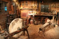 Recreated farm workshop with grinding wheel at Billings Farm & Museum. Woodstock, VT.