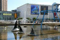 Whale fin statues & learning activities in courtyard of Pacific Science Center. Seattle, WA.