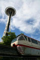 Alweg Monorail built for Seattle World's Fair passes Space Needle. Seattle, WA.
