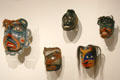 Collection of Northwest Coast native wooden human face masks at Seattle Art Museum. Seattle, WA.