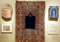 Islamic art at Seattle Art Museum with an Anatolian prayer rug , Persian tombstone & tile. Seattle, WA.