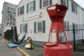 Coast Guard Museum Northwest at Pier 36 with anchor, bell & buoy. Seattle, WA
