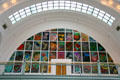 Multipanel glass paintings by Dale Chihuly in arched window of Tacoma Union Station. Tacoma, WA.