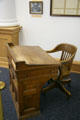 Desk & chair used in Old Thurston County Courthouse in when it served as Washington State Capitol. Olympia, WA.