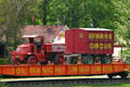 Antique circus truck & trailer on railway flat car at Circus World Museum. Baraboo, WI.
