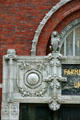Sullivan decoration with lion & date on Farmer's & Merchant's Union Bank. Columbus, WI.