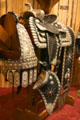 Forrest Riley Parade Saddle with silver decoration by San Fernando Valley Saddlery at Nelson Museum of the West. Cheyenne, WY.