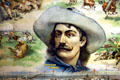 Cowboy portrait on poster of show scenes of Buffalo Bill's Wild West show at Buffalo Bill Center of the West. Cody, WY.