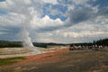 Crowds watching Old Faithful at Yellowstone National Park. WY.