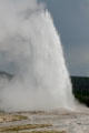 Old Faithful spouts at Yellowstone National Park. WY