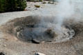Bubbling mud hole at Yellowstone National Park. WY