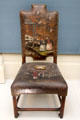 English leather chair painted with Chinese scene at Lady Lever Art Gallery. Liverpool, England.