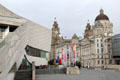 Exterior texture of Museum of Liverpool with heritage buildings beyond. Liverpool, England.