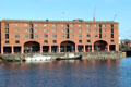 Royal Albert Dock warehouse built entirely of iron, brick & stone to be fireproof, thus becoming a dock of choice for high value cargo like silks cotton, ivory, tea, tobacco, sugar. Liverpool, England.