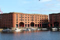 Royal Albert Docks were partly bombed in WWII & did not start recovering until 1988 when museums & restaurants moved in. Liverpool, England.