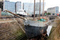 Heritage ships at Pier Head area with modern highrises beyond. Liverpool, England.