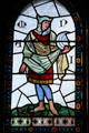 Stained glass window depicting Norse God Mani in Winter Smoking Room, at Cardiff Castle. Cardiff, Wales.