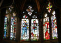 Stained glass windows, designed by William Burges, in Banqueting Hall at Cardiff Castle. Cardiff, Wales.