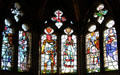 Stained glass windows, designed by William Burges, in Banqueting Hall at Cardiff Castle. Cardiff, Wales.