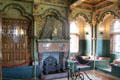 Chimneypiece with gilded bronze statue of St John the Evangelist by Burges & Fucigna in Lord Bute's bedroom at Cardiff Castle. Cardiff, Wales.