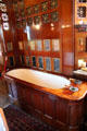 Bathtub encased in polished wood in Lord Bute's bathroom at Cardiff Castle. Cardiff, Wales.