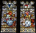 Stained glass windows with Evangelists John with eagle & Matthew with angel at Cardiff Castle. Cardiff, Wales.