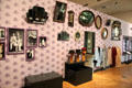 Gallery of vintage photos, mirrors & clothing at St Fagans National Museum of History. Cardiff, Wales.