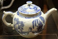Soft-paste porcelain teapot with blue on white design made in Vauxhall, London at National Museum of Wales. Cardiff, Wales.