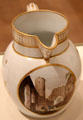 Pearlware jug with gold trim and view of Hall at Caerphilly Castle, decorated by Thomas Pardoe for Cambrian Pottery at National Museum of Wales. Cardiff, Wales.