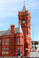 Ornate clock tower, chimneys & terracotta panels on the Pierhead building at Cardiff Bay. Cardiff, Wales.