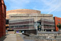 Bronze colored roof & multi-colored Welsh slate walls at Wales Millennium Centre at Cardiff Bay. Cardiff, Wales.