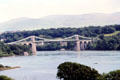 Menai Bridge spanning the Menai Straight between Anglesey Island & the mainland of Wales, one of the world's first suspension bridges, by Thomas Telford,. Bangor, Wales.