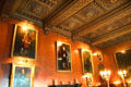 Paintings & ornate coffered ceiling in dining room at Penrhyn Castle. Bangor, Wales.