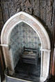 Fireplace with gothic arch, marble surround & English Delft tiles at Plas Newydd. Llangollen, Wales.