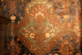 Detail of embossed leather wall covering with floral design at Plas Newydd. Llangollen, Wales.