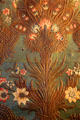 Detail of embossed leather wall covering with floral design at Plas Newydd. Llangollen, Wales.