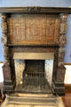 Jacobean style richly carved mantelpiece & fireplace lined with Dutch tiles at Plas Newydd. Llangollen, Wales.