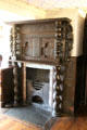 Fireplace surround with twisted carved wood columns at Plas Newydd. Llangollen, Wales.