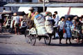 Carrying goods on a trishaw. Jogyakarta, Indonesia.