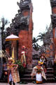 Balinese dancers in front of temple gate. Bali, Indonesia.