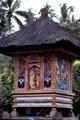 Shrine with thatched roof & painted exterior. Bali, Indonesia.