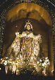Crowned Virgin figure within La Merced church in Cusco. Peru.